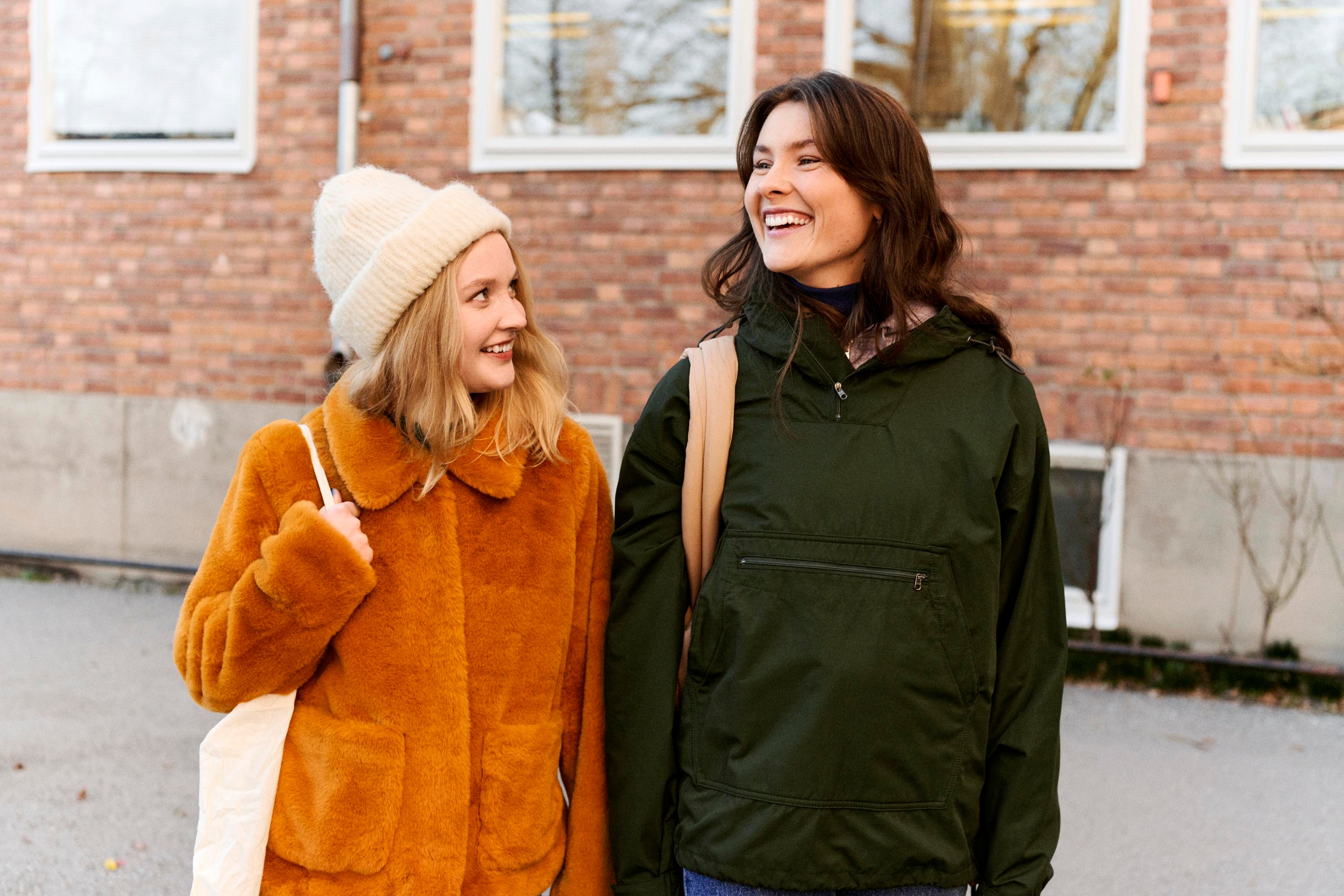 Two female students on their way to school